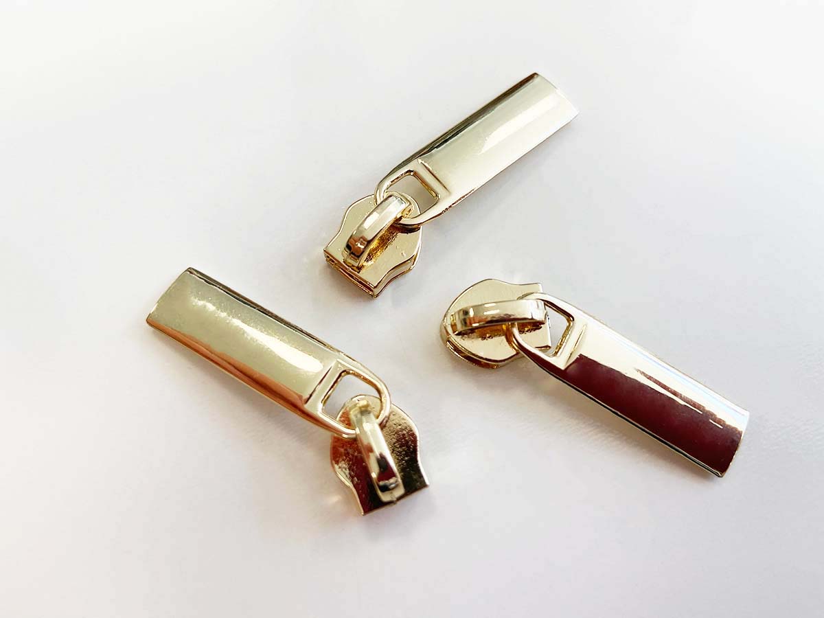 Zipper für Reißverschlüsse - gold Zipper für Reißverschlüsse - gold