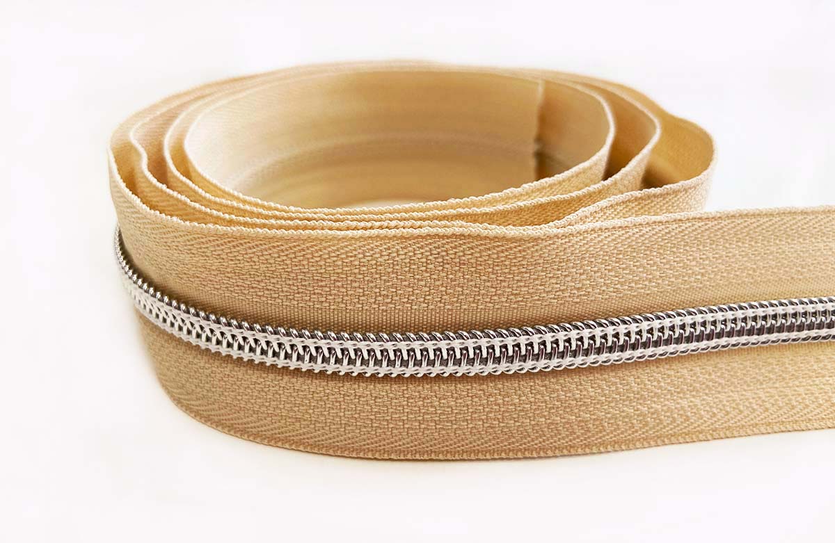 Reißverschluss in beige/silber - 1m - endlos     Reißverschluss in beige/silber - 1m - endlos