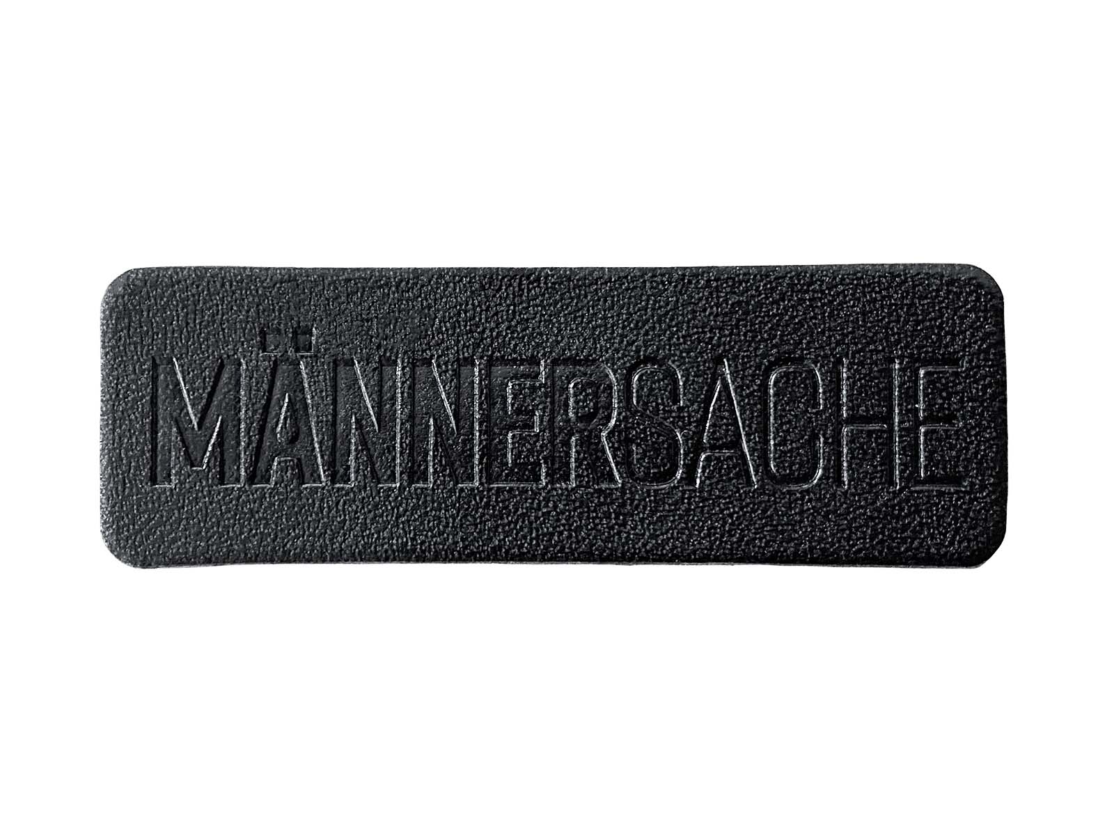 Label aus Kunstleder - "Männersache" in schwarz Label aus Kunstleder - "Männersache" in schwarz